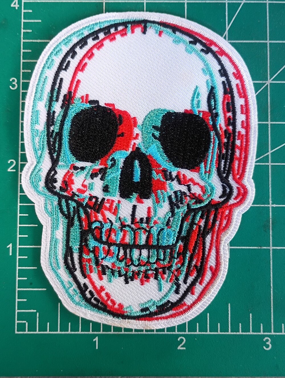 Embroidered Skull Patch in Black, Red & Teal